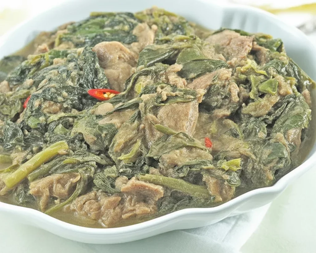 Traditional Filipino laing recipe featuring taro leaves and coconut milk