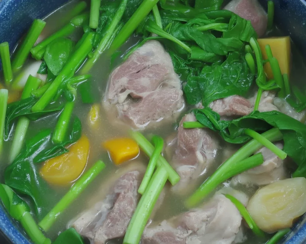 A bowl of Bulanglang, a Filipino boiled vegetable soup, highlighting fresh vegetables.