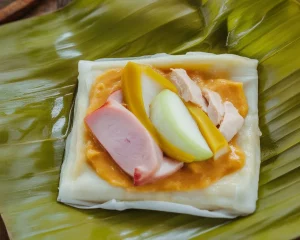Read more about the article Filipino Tamales Made with Rice Flour & Peanut Sauce