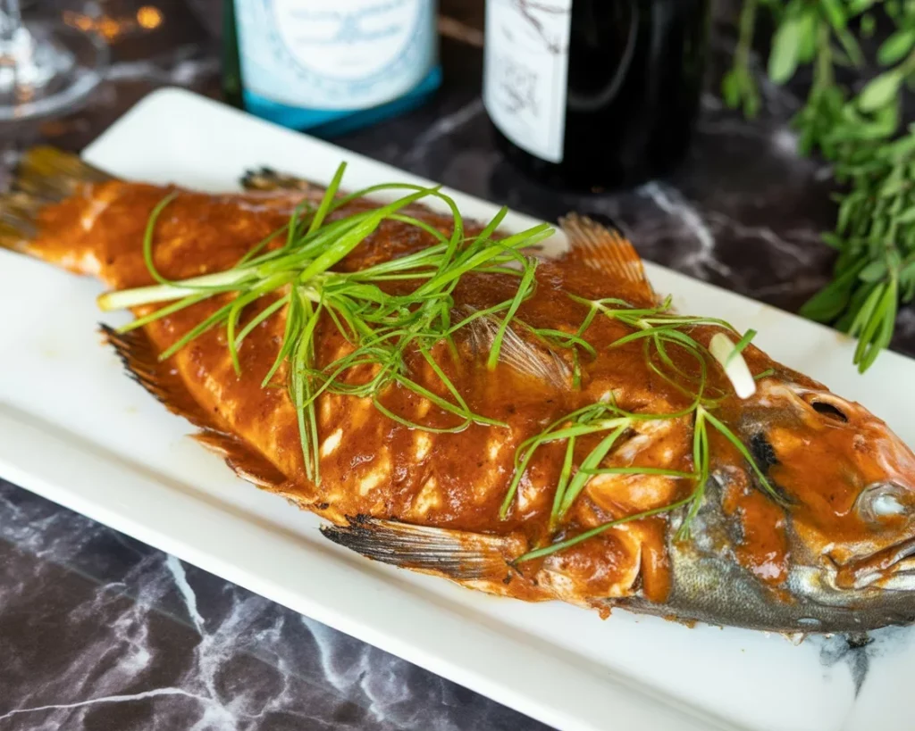 Oven grilled whole fish, Filipino inihaw na isda with fresh ingredients.