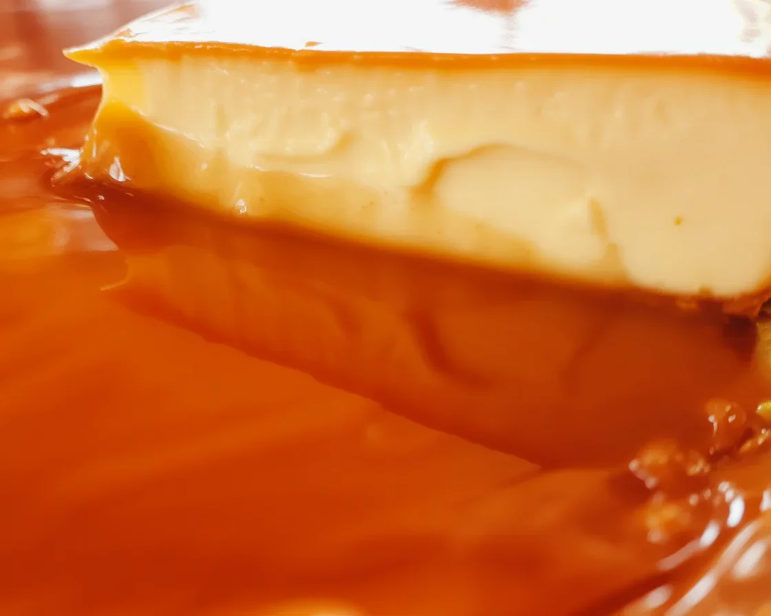 Filipino Crockpot Leche Flan Cheesecake with golden caramel topping