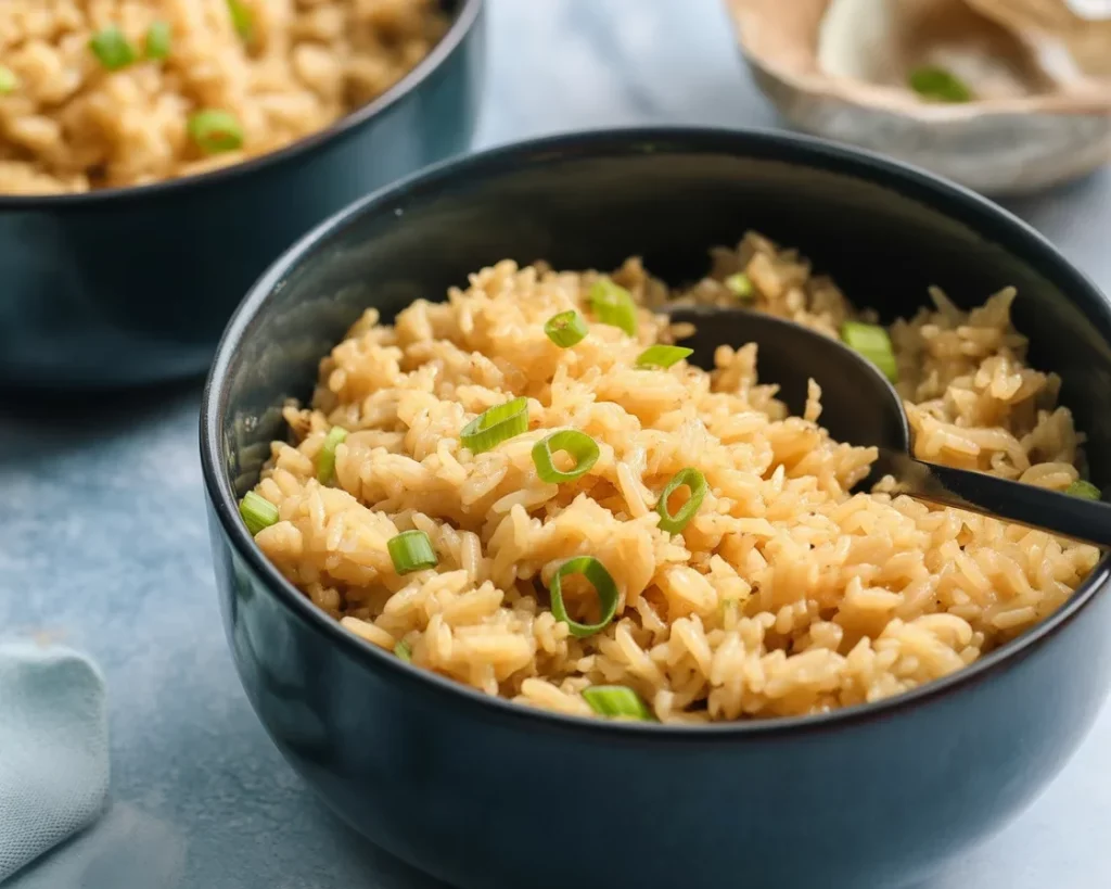 Delicious Garlic Rice Omelette served with fluffy rice and melty cheese on top.