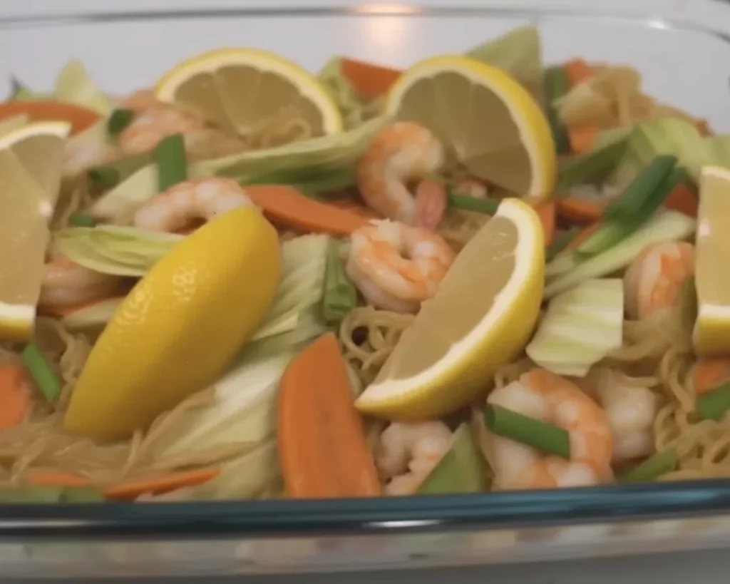 Mini Pancit Bihon Cups with vegetables and meat for a festive Filipino dish
