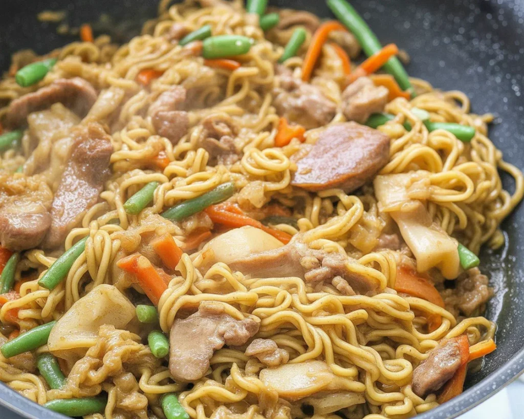 Delicious Pancit Canton Snack Bowl, a quick and flavorful Filipino noodle dish.