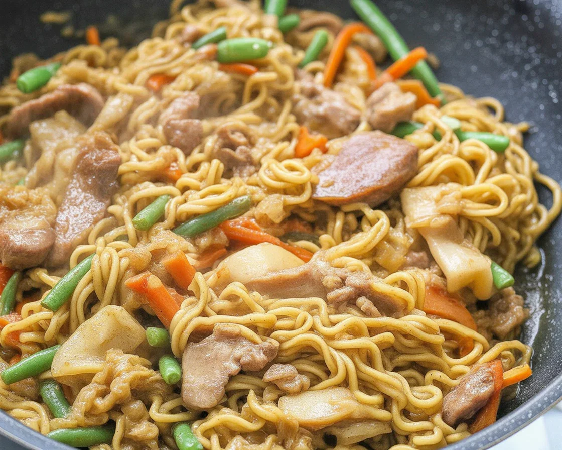Delicious Pancit Canton Snack Bowl, a quick and flavorful Filipino noodle dish.