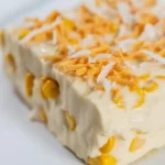 A delicious plate of creamy Maja Blanca dessert, made with coconut milk and cornstarch.