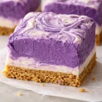 Delicious no-bake ube graham dessert cups topped with whipped cream.