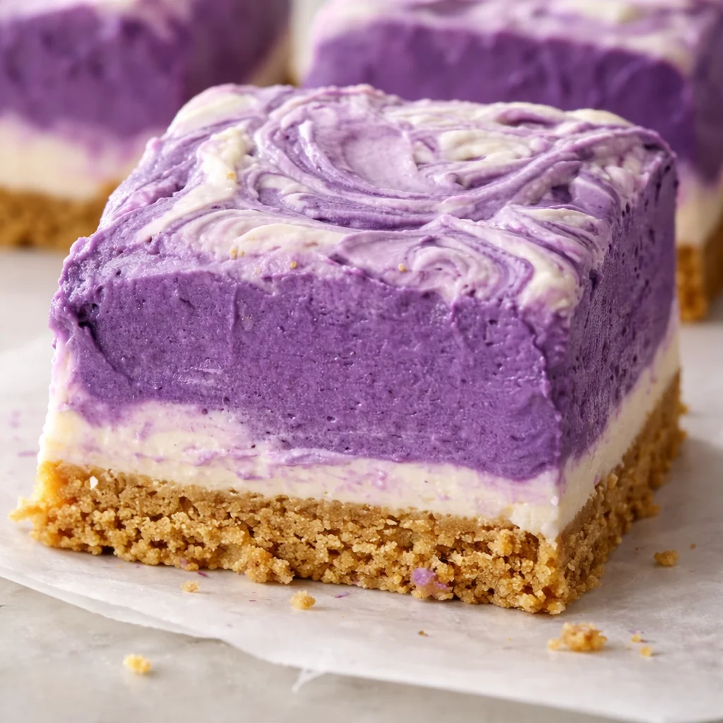 Delicious no-bake ube graham dessert cups topped with whipped cream.