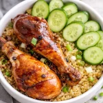 Colorful healthy Chicken Adobo Quinoa Bowl with veggies and spices