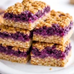 Deliciously Chewy Ube Banana Oatmeal Bars to Energize Your Day 5 Delicious Ube Banana Oatmeal Bars with oats and ripe bananas, perfect for snacks or breakfast.