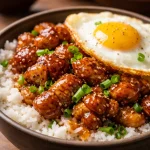 Honey soy chicken rice bowl Filipino style with sticky chicken and rice
